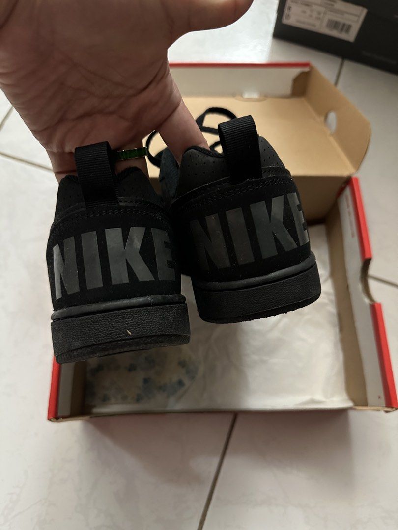 Nike Court Borough Low (GS) (Category: Sneakers) located in San Fernando. Submitted by baratileahko (Listing ID 1447196907, Image 3). Description: - Classic black Nike low-top sneakers - Lace-up closure - Iconic Nike logo on side and heel - Durable rubber sole for everyday comfort - Includes original Nike box - Ideal for casual, everyday wear.