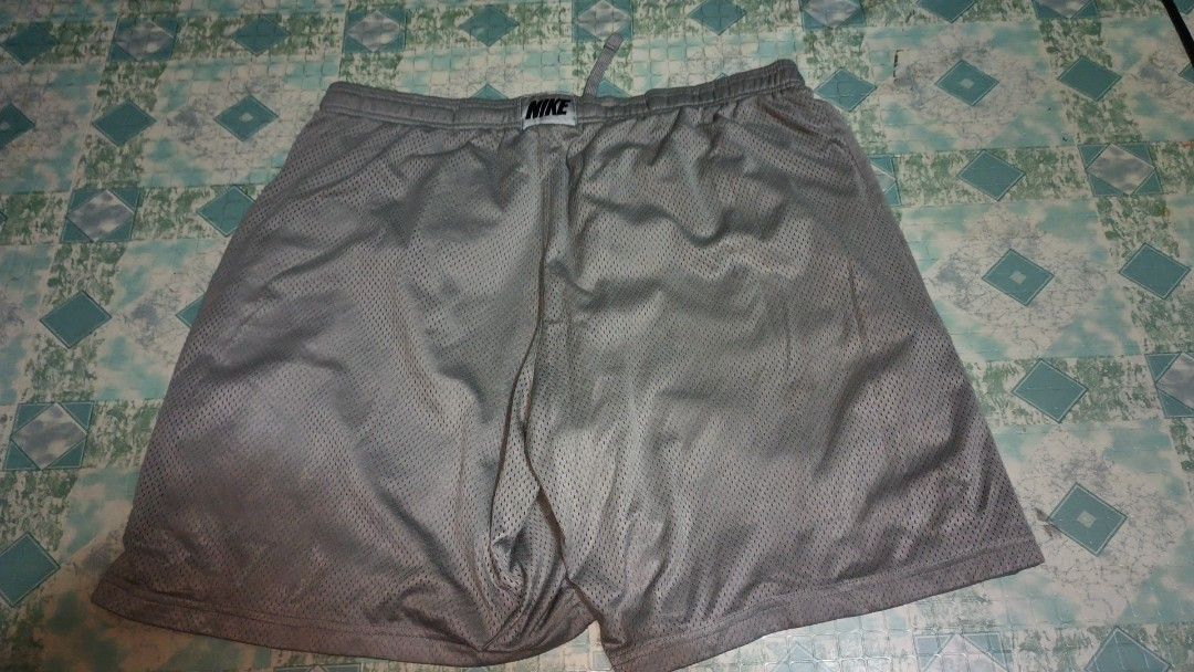 Nike Grey mesh Shorts (XXL) (Category: Shorts) located in Manila. Submitted by doommf (Listing ID 1447286865, Image 2). Description: ‎Nike Grey mesh Shorts (XXL) ‎Waist 34-40 ‎Length 20 ‎Hem 30 ‎Issue 2small pinholes ‎499+sf.