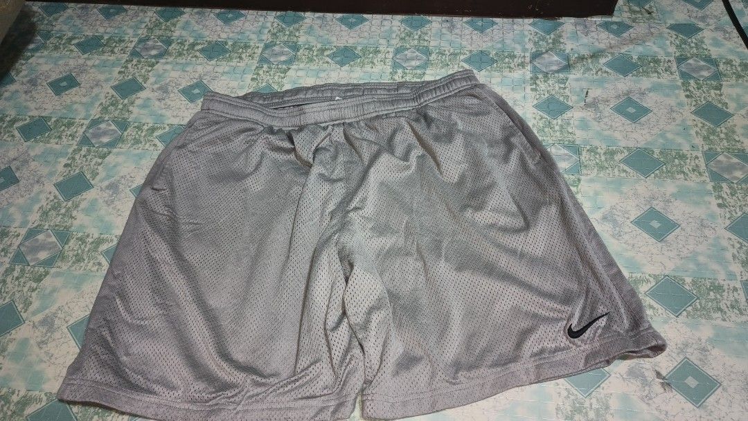 Nike Grey mesh Shorts (XXL) (Category: Shorts) located in Manila. Submitted by doommf (Listing ID 1447286865, Image 1). Description: ‎Nike Grey mesh Shorts (XXL) ‎Waist 34-40 ‎Length 20 ‎Hem 30 ‎Issue 2small pinholes ‎499+sf.