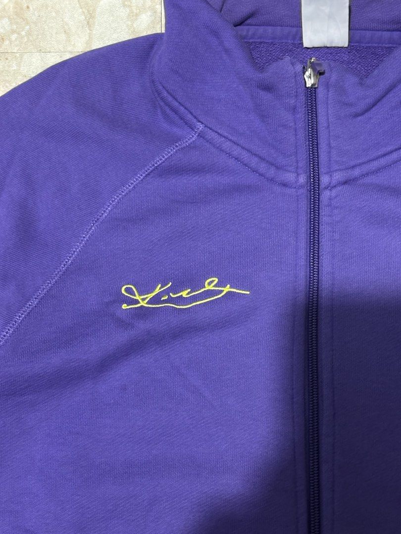 Nike Purple Track Jacket with Signature - Size L (Category: Coats, Jackets and Outerwear) located in Manila. Submitted by jlogup08 (Listing ID 1447282321, Image 2). Description: - Purple Nike track jacket - Yellow Nike swoosh detail -19 by 27 - Signature embroidered on chest - Full zip closure - Convenient pockets - Made in China - Size L - Ideal for casual wear or sports activities.