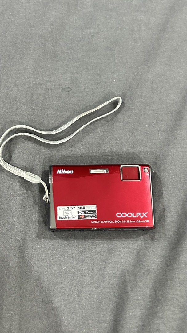 Nikon Coolpix S60 Red Digital Camera with Charger (Category: Cameras) located in San Fernando. Submitted by TheBTBs (Listing ID 1447172429, Image 3). Description: - Red Nikon Coolpix S60 Digital Camera - 3.5 inch Touchscreen - 10x Optical Zoom - Includes Nikon MH-63 Battery Charger and Cables - Great for everyday photos - Ready for its new owner NOTE: The LCD screen has some vignetting/darkening around the corners and edges of the display. This i