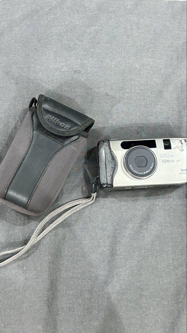 Nikon Zoom Lens 38-80mm Macro Quartz Date Camera (Category: Cameras) located in San Fernando. Submitted by TheBTBs (Listing ID 1447171721, Image 1). Description: - Nikon 100 QD AF Zoom Lens Camera - Lens: 38-80mm Macro - Includes Nikon case and strap NOT SURE IF WORKING PA HEHE.