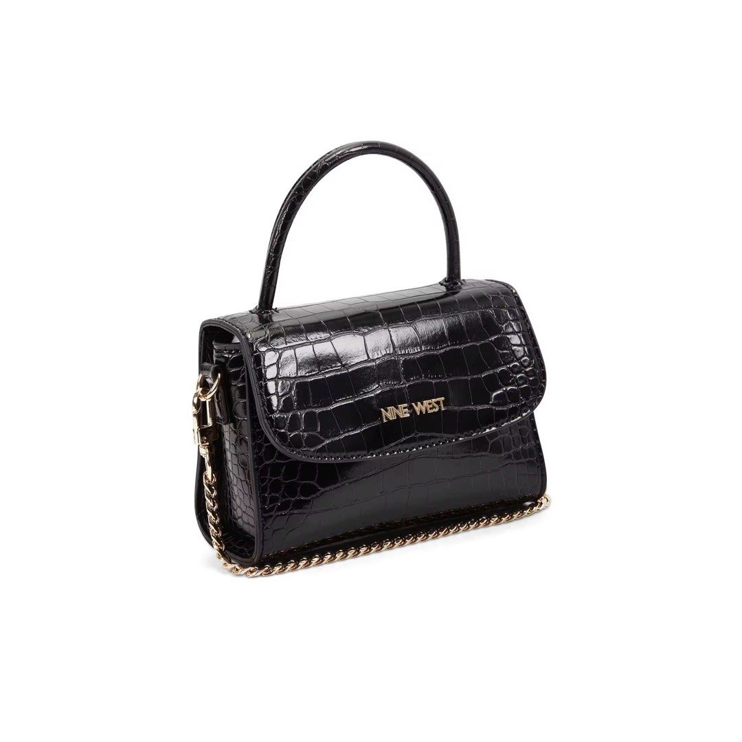 Nine West Dayle Mini Top Handle Flip Bag (Category: Cross-body Bags) located in Manila. Submitted by ceethingsout (Listing ID 1447109460, Image 2). Description: Nine West Dayle Mini Bag *last 3 photos are the actual item* • Chic black croc embossed finish •Top handle and detachable chain strap •Bought for ₱3,450, still comes with original dust bag and tags. .