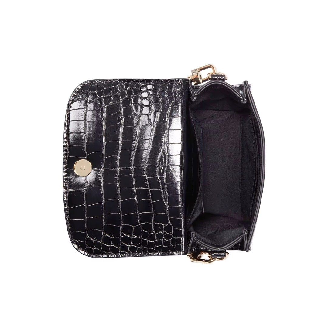 Nine West Dayle Mini Top Handle Flip Bag (Category: Cross-body Bags) located in Manila. Submitted by ceethingsout (Listing ID 1447109460, Image 3). Description: Nine West Dayle Mini Bag *last 3 photos are the actual item* • Chic black croc embossed finish •Top handle and detachable chain strap •Bought for ₱3,450, still comes with original dust bag and tags. .
