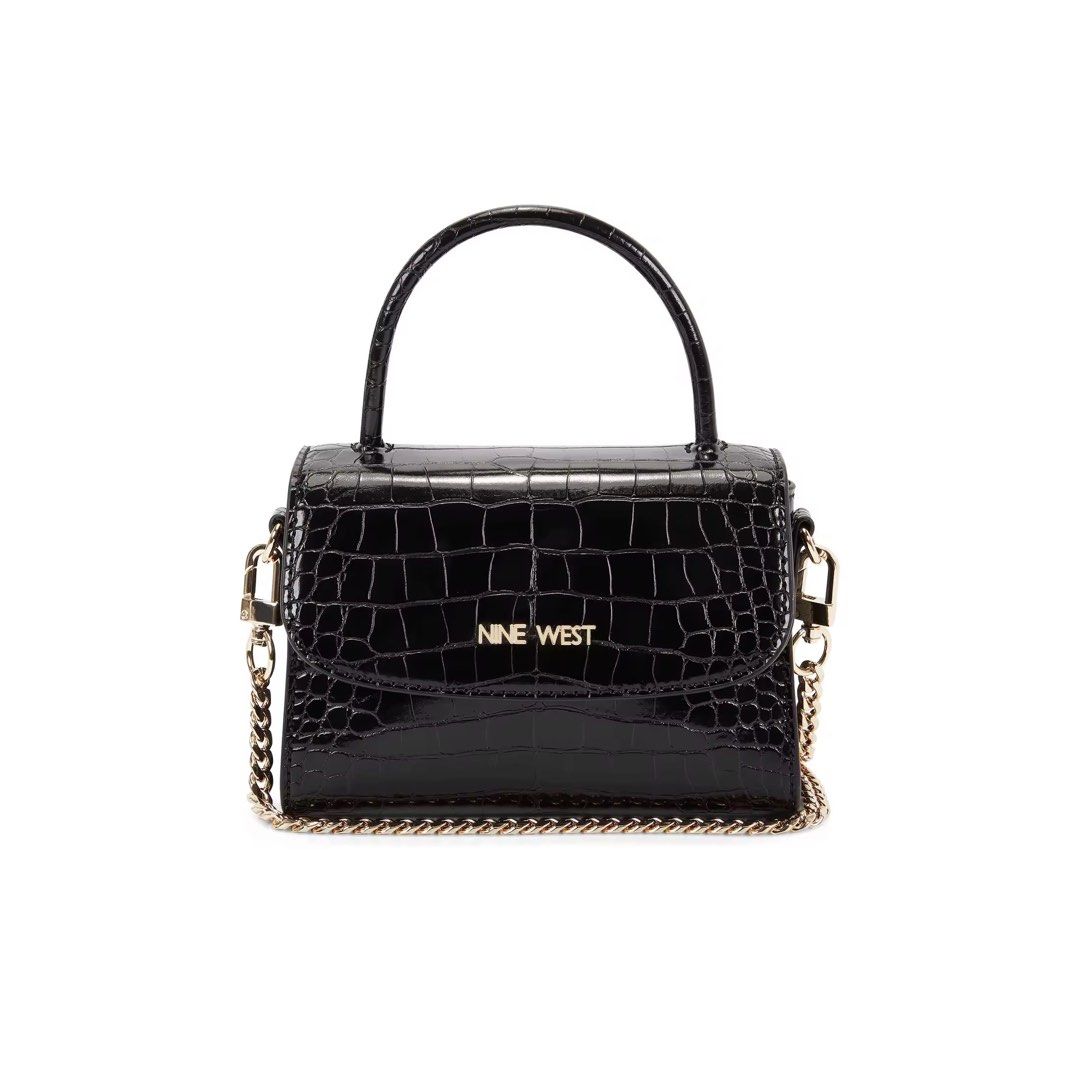 Nine West Dayle Mini Top Handle Flip Bag (Category: Cross-body Bags) located in Manila. Submitted by ceethingsout (Listing ID 1447109460, Image 1). Description: Nine West Dayle Mini Bag *last 3 photos are the actual item* • Chic black croc embossed finish •Top handle and detachable chain strap •Bought for ₱3,450, still comes with original dust bag and tags. .