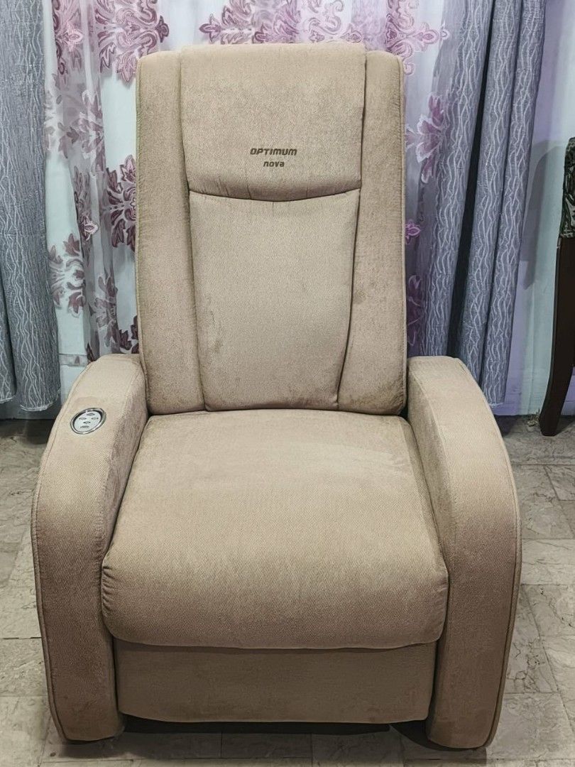 FOR SALE‼️Optimum Nova Massage Recliner Chair (Category: Chairs) located in Dasmarinas. Submitted by maxie18 (Listing ID 1447117181, Image 3). Description: Beige Optimum Nova massage recliner ✅Built-in footrest and cup holder ✅Convenient armrest control panel - Minor stains on seat cushion - Back panel exposes internal mechanism (fully functional) Freebie: Lex foot massager ✨ For sure buyers, pwedeng pwede icheck muna yung unit before kunin. Feel
