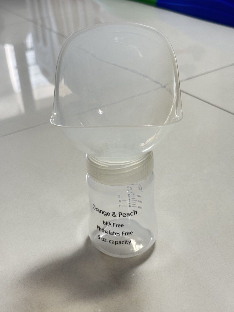 Orange & Peach manual milk collector (Category: Breastfeeding & Bottle Feeding) located in Manila. Submitted by declutter_with_mrs (Listing ID 1447182816, Image 1). Description: .