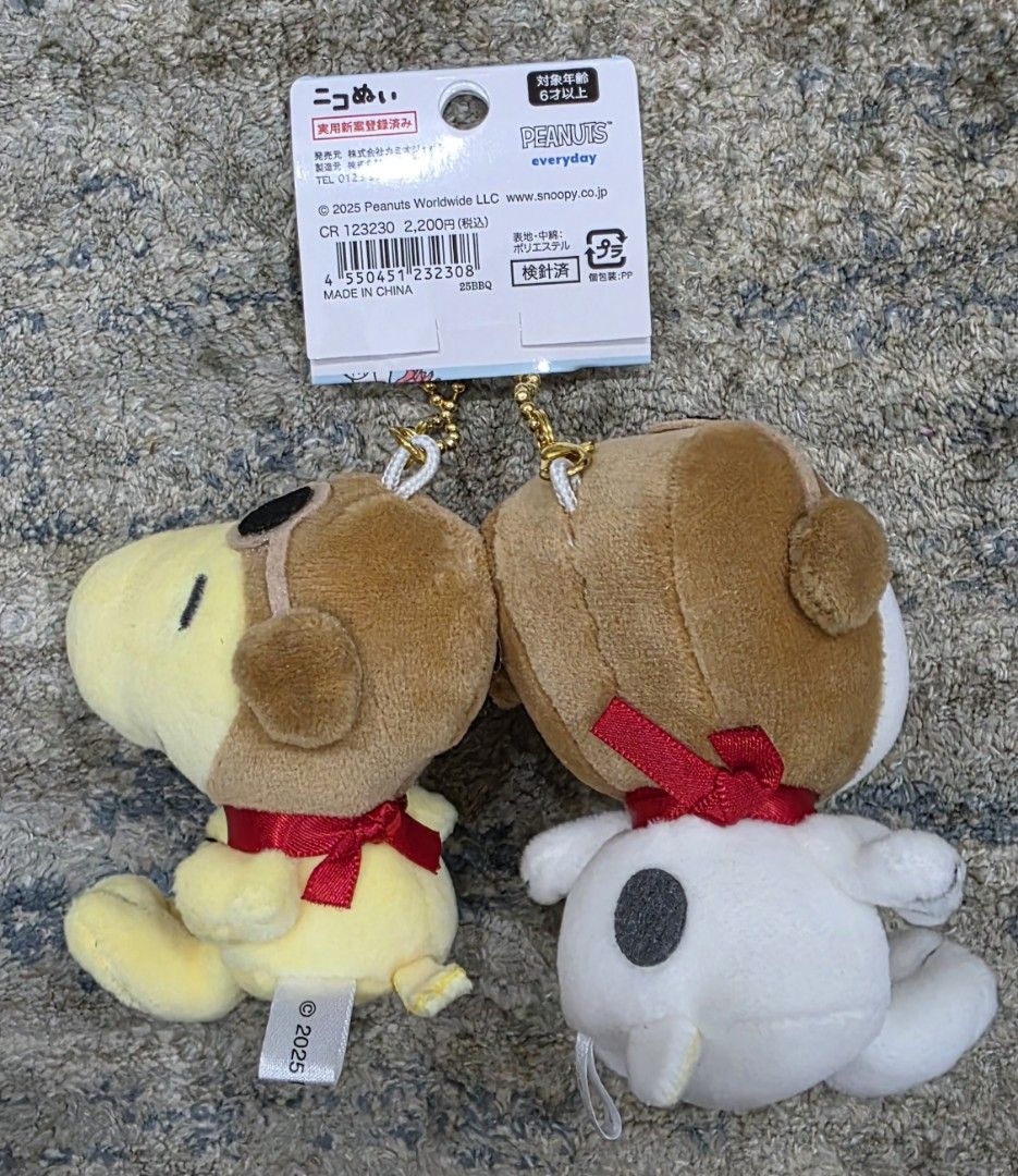Peanuts Snoopy & Woodstock Plush Keychains Set (Category: Plushies & Soft Toys) located in Manila. Submitted by chikawa3 (Listing ID 1447278865, Image 2). Description: Bought in Japan Adorable Snoopy and Woodstock plush keychains with magnet - Features a cute pilot theme with goggles and hats. - Adorned with charming red ribbon bows around their necks. - Ideal for personalizing bags, backpacks, and more. - Officially licensed Peanuts merchandise,