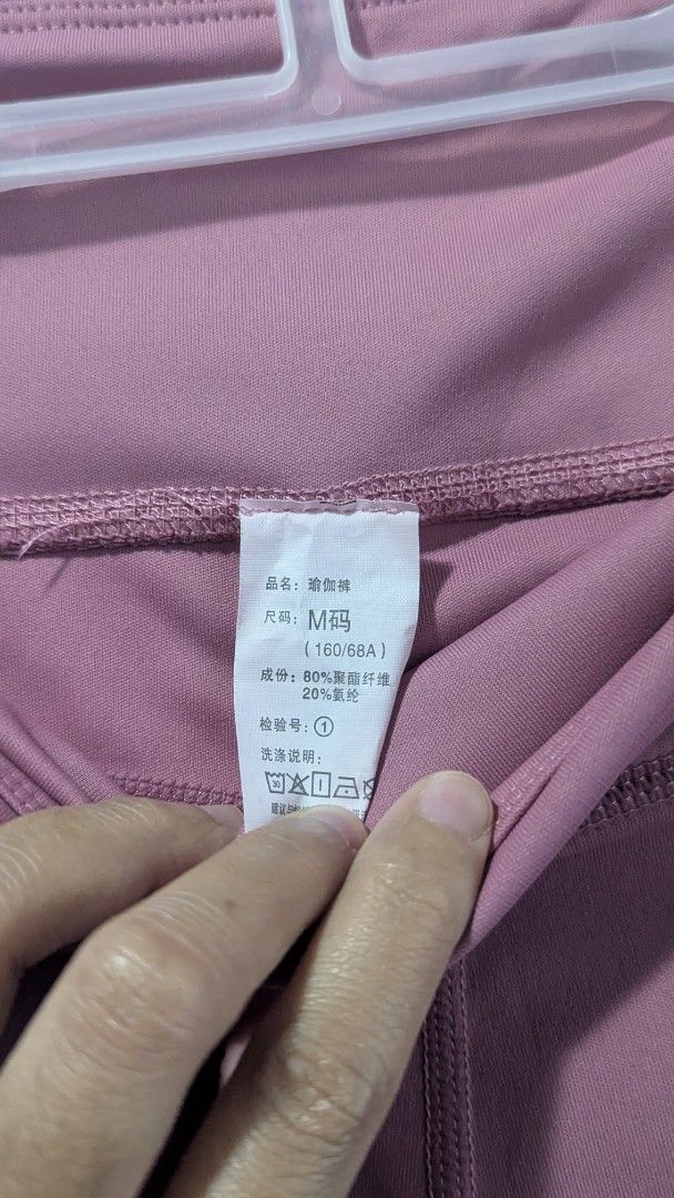 Pink High-Waisted Leggings with Pockets (Category: Activewear) located in Marikina City. Submitted by mlektea (Listing ID 1447179198, Image 2). Description: - Pink leggings used once - Bought online, makapal siya - High-waisted for a comfy fit - Features convenient mesh side pockets - Versatile for workouts or casual outfits - Fits XS to small petite frames.