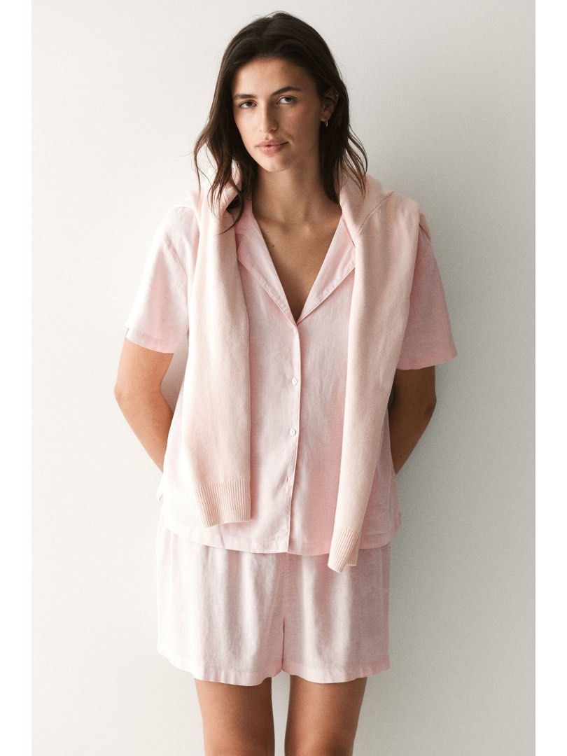 Pink Linen Pajama Set (Category: Undergarments & Loungewear) located in Manila. Submitted by paperthread (Listing ID 1447265200, Image 2). Description: No when worn because they are tied/looped together with the tag - Super comfy pink pajama set - Made from a soft, breathable linen-like material - Short sleeve button-up top - Matching shorts with elastic waistband for a relaxed fit - Ideal for lounging at home.