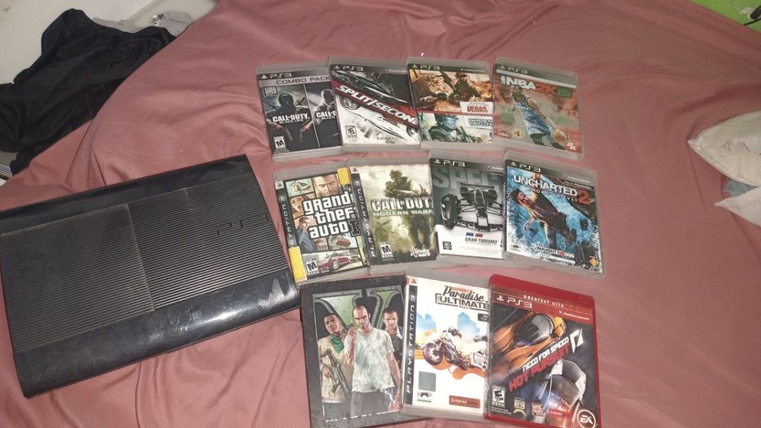 PlayStation 3 Console with 10 Games (Category: PlayStation) located in Manila. Submitted by puredeer_53ad7f (Listing ID 1447209300, Image 1). Description: - PlayStation 3 (PS3) Console - Bundle includes 11 Games - Popular Titles: Grand Theft Auto V, Uncharted 2, Call of Duty (multiple titles) - All game discs are in their original cases - Excellent value for any gamer looking for a PS3 experience issue:HDMI (REPAIRABLE) DISPLAY WORKS WITH AV CABL