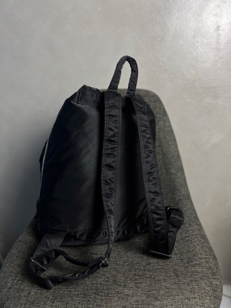 Porter Yoshida & Co - Tanker Rucksack (Category: Backpacks) located in Quezon City. Submitted by cityboycrates_ph (Listing ID 1447223561, Image 3). Description: Size: OS Material: Nylon Twill Made In: Japan Condition: Good Condition Color rate: 9.5/10 Issue: Loose stitch on velcro Exact metrics shared upon inquiry. Take a quick moment to double-check the size & condition. Once an order is placed and confirmed, we may not be able to make changes o