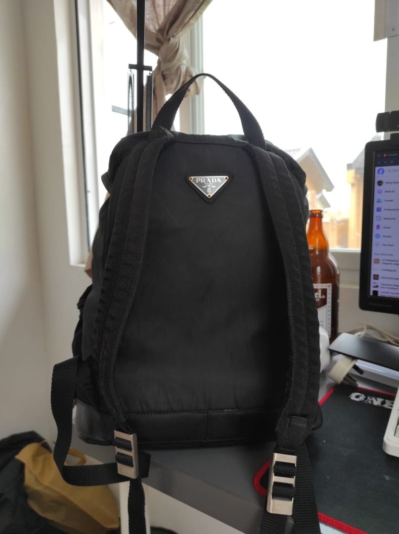 Prada Nylon Backpack Black Made in Italy (Category: Luxury Bags & Wallets) located in Malolos. Submitted by highkeys (Listing ID 1447209437, Image 2). Description: - Authentic Prada backpack - Black nylon material - Made in Italy - Multiple front pockets - Spacious main compartment - Adjustable straps for comfort - Ideal for everyday use or travel.