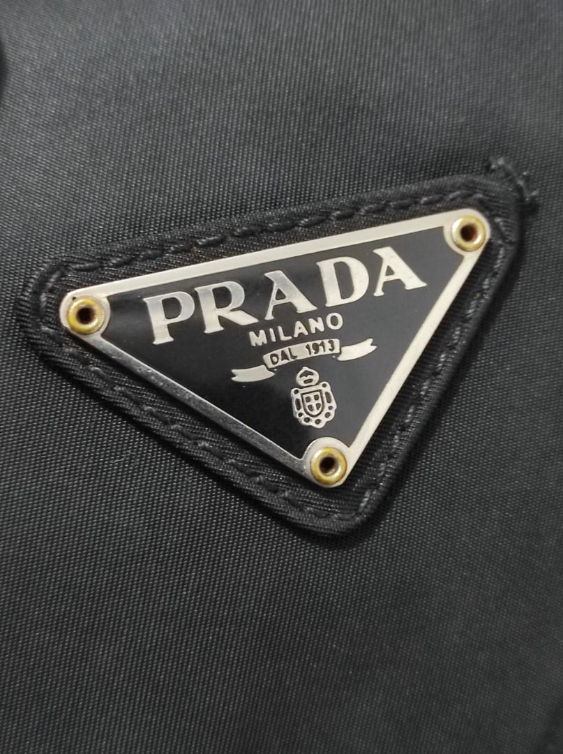 Prada Nylon Backpack Black Made in Italy (Category: Luxury Bags & Wallets) located in Malolos. Submitted by highkeys (Listing ID 1447209437, Image 3). Description: - Authentic Prada backpack - Black nylon material - Made in Italy - Multiple front pockets - Spacious main compartment - Adjustable straps for comfort - Ideal for everyday use or travel.