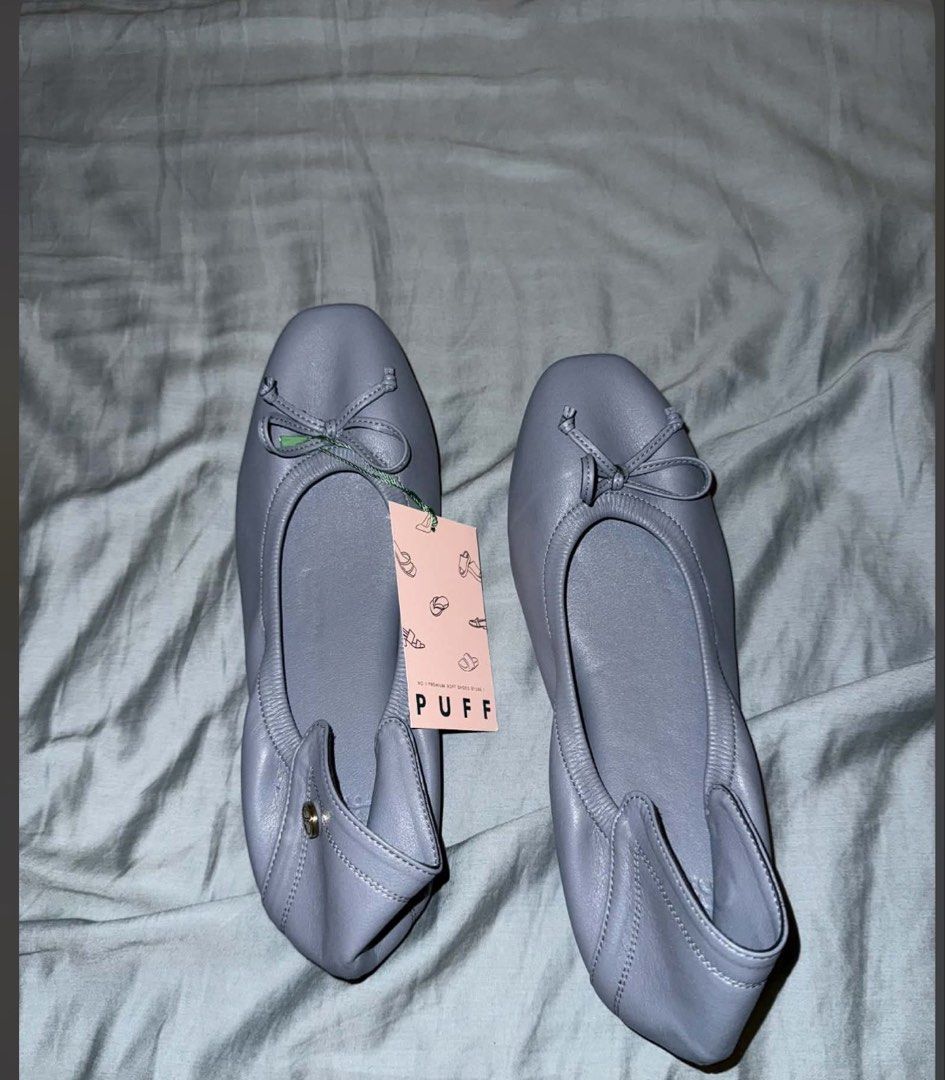 Puff Grey Leather Ballet Flats (Category: Flats & Sandals) located in Taguig. Submitted by _pattyp (Listing ID 1447288152, Image 1). Description: - Grey blue leather ballet flats from Puff - Cute bow detail on the front - Elasticated sides for a comfortable fit - Small button detail on the side of the heel - Comes with original tag from thailand Size 235.