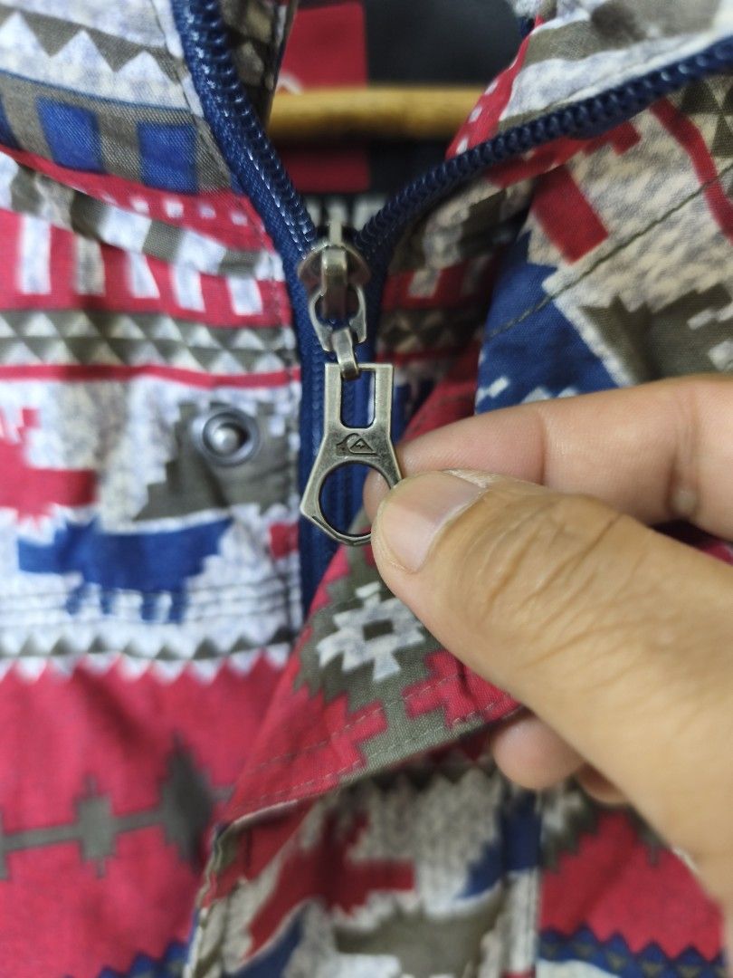 Quiksilver Hooded Vest - Size M - Aztec Pattern (Category: Vests) located in Baguio. Submitted by vongacayan.vongacayan (Listing ID 1447197774, Image 3). Description: - Quiksilver vest with hood - Vibrant Aztec-inspired pattern - Sleeveless design for easy layering - Zipper closure - Size: Medium (M) - Ideal for casual wear.