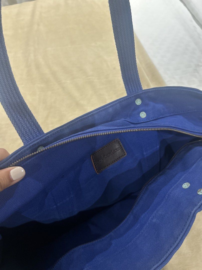Ralph Lauren Canvas Tote Bag (Category: Shoulder Bags) located in San Fernando. Submitted by thriftcsfp (Listing ID 1447246615, Image 2). Description: Ralph Lauren Canvas Tote Bag in Blue. Can fit a lot of stuff..