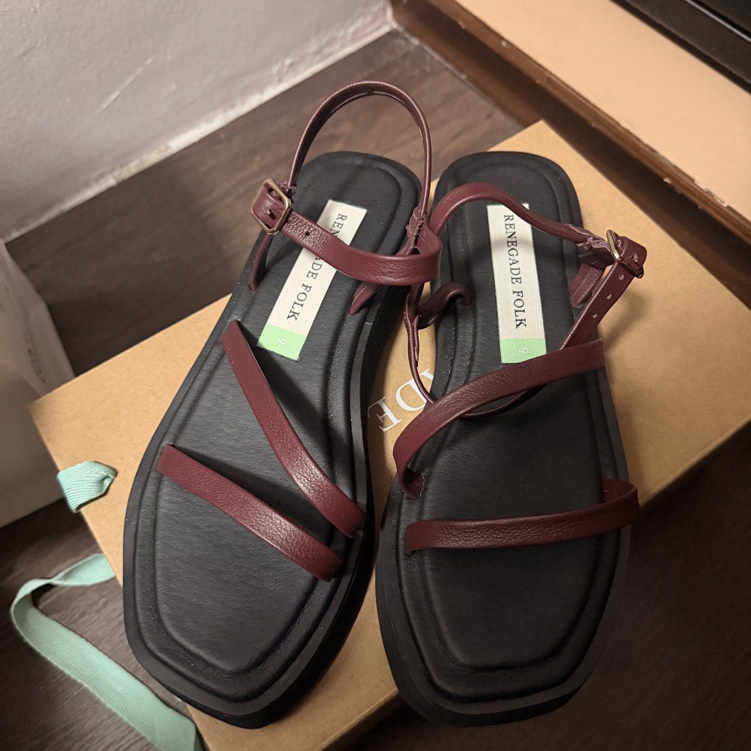 Renegade Folk Burgundy Slow Down Slides (Category: Flats & Sandals) located in San Pedro. Submitted by love.bruce10 (Listing ID 1447239701, Image 2). Description: - Burgundy strappy sandals by Renegade Folk - Features a platform sole for added height - Adjustable ankle strap for a secure fit - Perfect for casual outings - Soles shown in photos for condition check - BEST PRICE: 4K :) brand new, tried on a few times only. Orig price 4,490.