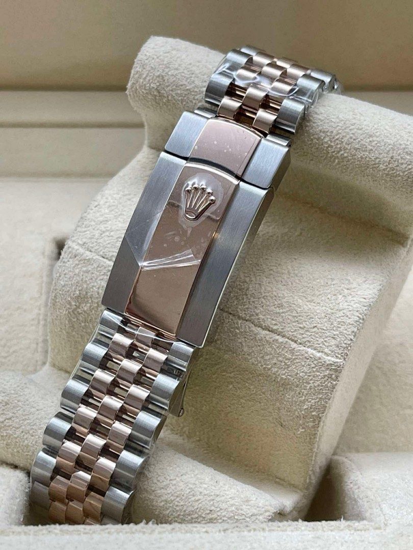 DATEJUST 36 WHIMBLEDON TWO TONE RG. (Category: Luxury Watches) located in Manila. Submitted by watchesbyjamesdy (Listing ID 1447185749, Image 3). Description: - Rolex Oyster Perpetual Datejust - Two-tone stainless steel and rose gold construction - Elegant grey dial with Roman numeral hour markers - Iconic fluted bezel - Comfortable Jubilee bracelet - Reliable automatic movement - Convenient date window at 3 o'clock - A timeless and classic timep