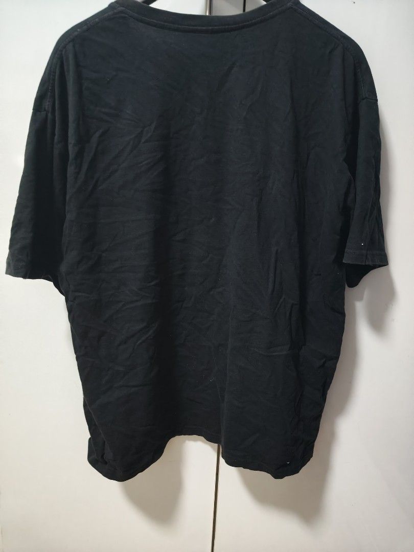 SHEIN Black Graphic T-Shirt (Category: Tshirts & Polo Shirts ) located in Mandaluyong City. Submitted by derekalava (Listing ID 1447245088, Image 3). Description: - for sale Brand: SHEIN t shirt - Color: Black - Design: Bold graphic print on front - Sleeves: Short - Neckline: Classic crew neck - Material: Comfortable fabric - Origin: Made in China - Style: Casual wear - Pairing: Easy to match with jeans or shorts.