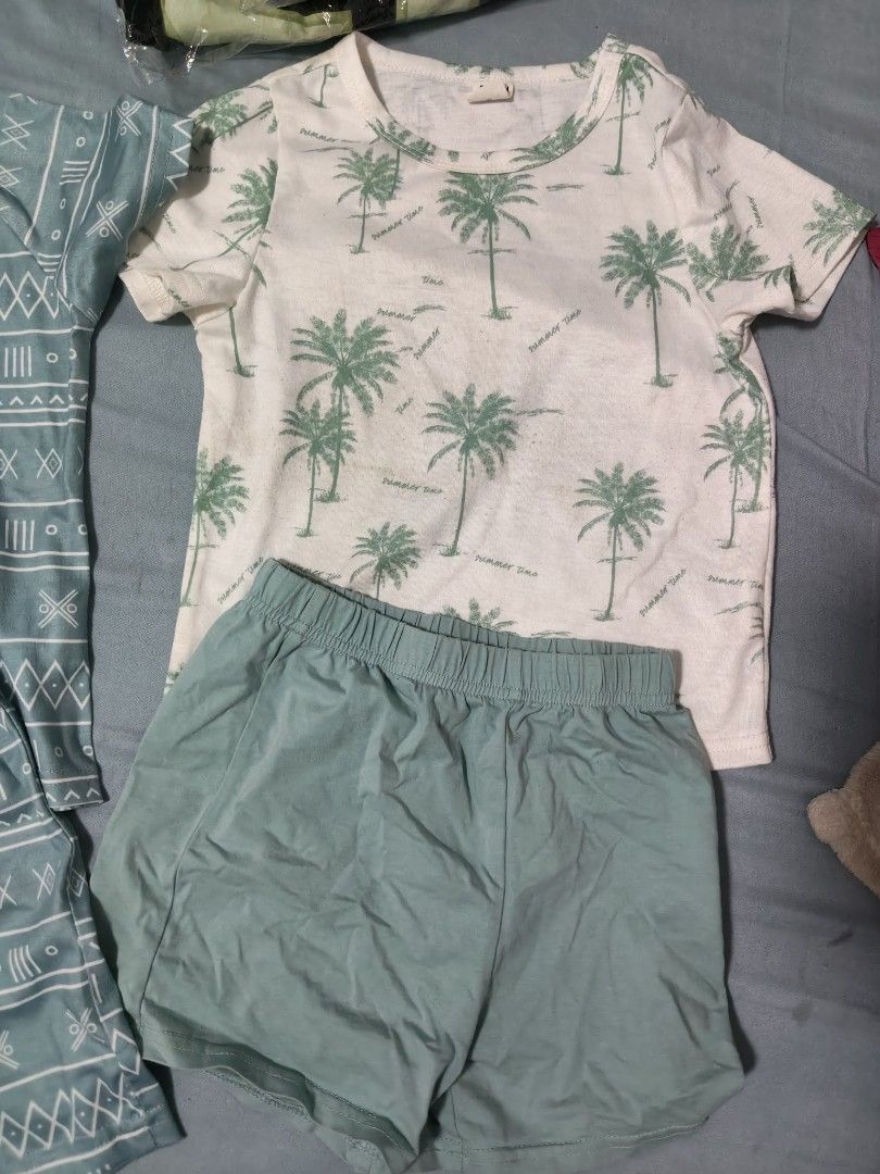 SHEIN Kids Pajama Set Size 2-3Y (Category: Babies & Kids Fashion) located in Mandaluyong City. Submitted by derekalava (Listing ID 1447246484, Image 3). Description: for sale SHEIN clothes and shoest - Size: 2-3 Years Old - Set 1: Teal geometric pattern - Set 2: White top with green palm trees and solid teal shorts - Ideal for sleeping or lounging at home if interested please call txt or pm me see pics for the condition thank you .