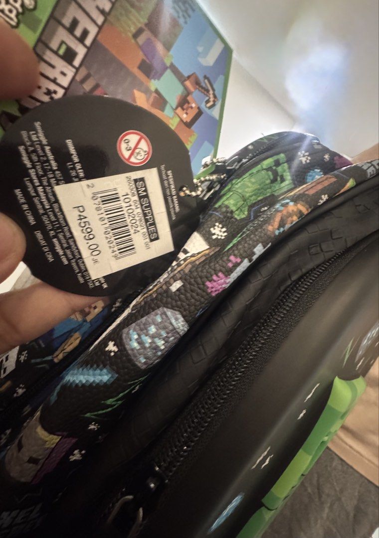Smiggle Limited ed. Minecraft Rolling Backpack (Category: Backpacks) located in Las Pinas. Submitted by marcovc (Listing ID 1447162098, Image 3). Description: - Authentic Smiggle rolling backpack - BRAND NEW NEVER USED WITH TAGS - Equipped with wheels and a retractable handle for easy carrying RFS: trolley bags not allowed sa school.