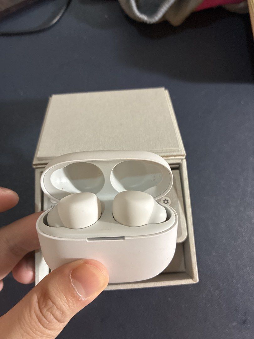SONY LinkBuds White Wireless Earbuds Charging Case (Category: Earphones) located in Manila. Submitted by iamawesome_decluttering (Listing ID 1447197205, Image 2). Description: - White wireless earbuds - Includes original charging case - Comes in original box - Earbuds fit securely in case - Ready for a new owner.