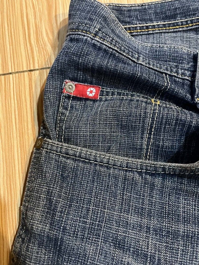 Southpole Denim Shorts Size 34 (Category: Shorts) located in Davao. Submitted by skebedelejdie (Listing ID 1447173732, Image 3). Description: - Southpole denim shorts - Classic blue wash - Size 34 waist - Button and zip closure - Two back pockets with stitching detail - Red logo tab on front pocket - Ideal for casual wear.