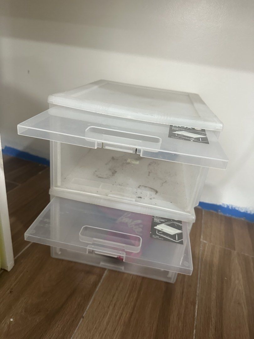 Stackable Clear Shoe Storage Boxes with Retractable Drawers (Category: Storage Boxes & Baskets) located in Pasig City. Submitted by marikondolifeph (Listing ID 1447147824, Image 2). Description: - Set of 2 large clear storage boxes - Stackable design - Retractable drawers for easy access - Ideal for organizing shoes or other items - Minor dust and scuffs from storage (please check photos) - Helps keep your space tidy -still goo but needs cleaning