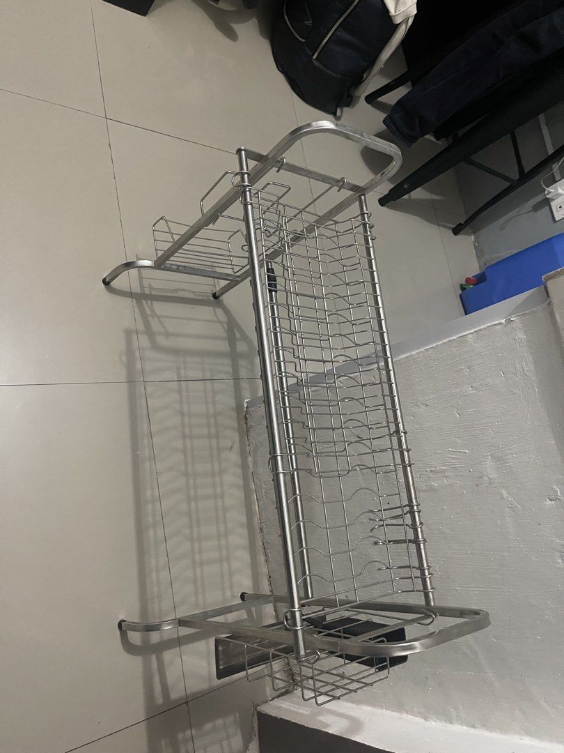 Stainless Steel Dish Rack with Draining Tray (Category: Other Kitchenware & Tableware) located in Del Monte. Submitted by mhinaesguerra (Listing ID 1447133505, Image 1). Description: - Made of durable stainless steel - Multiple tiers for ample drying space - Separate tray to catch water drips - Sturdy construction for stability - Easy to assemble - Perfect for organizing your kitchen sink area.