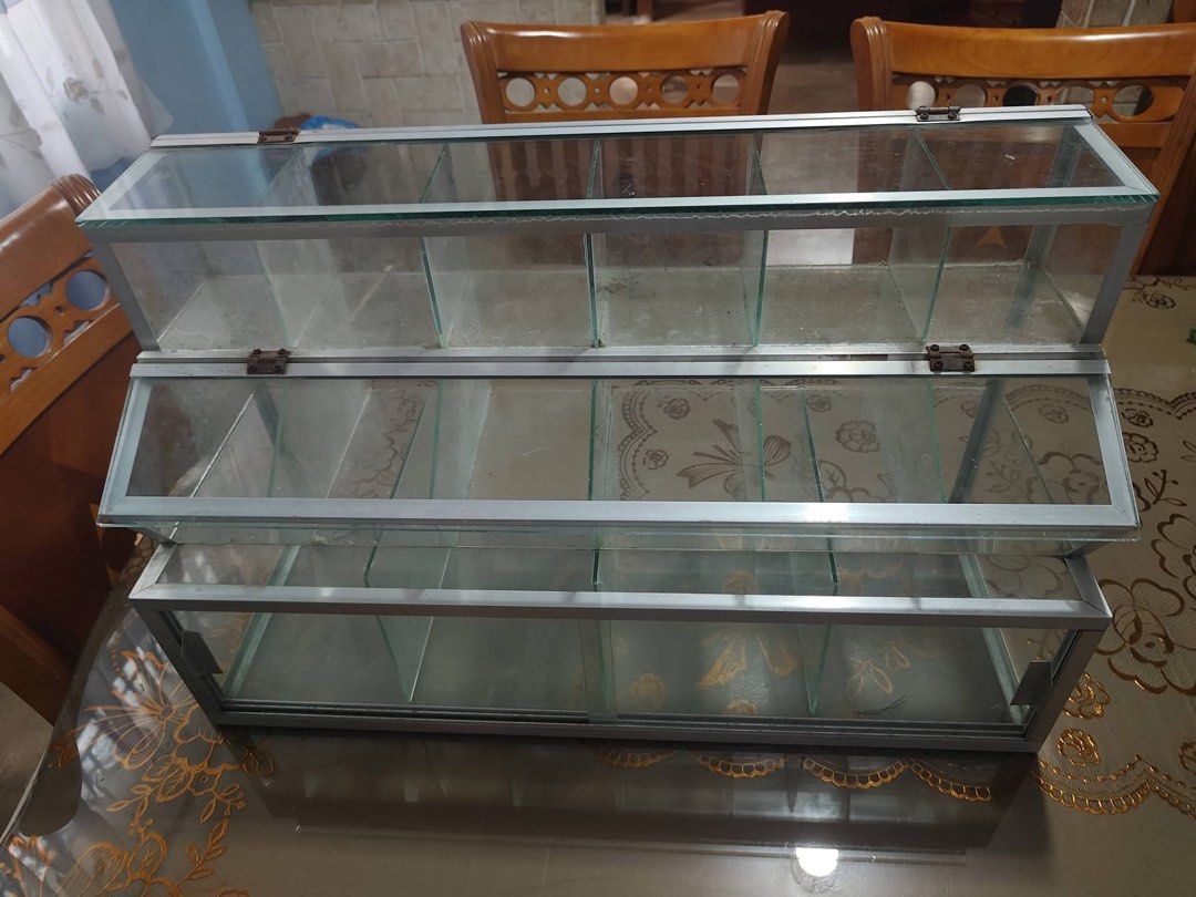 Stante Glass Display (Category: Shelves, Cabinets & Racks) located in Binan City. Submitted by preloved.cara (Listing ID 1447202126, Image 1). Description: Perfect for sar-sari store (candy, biscuits).