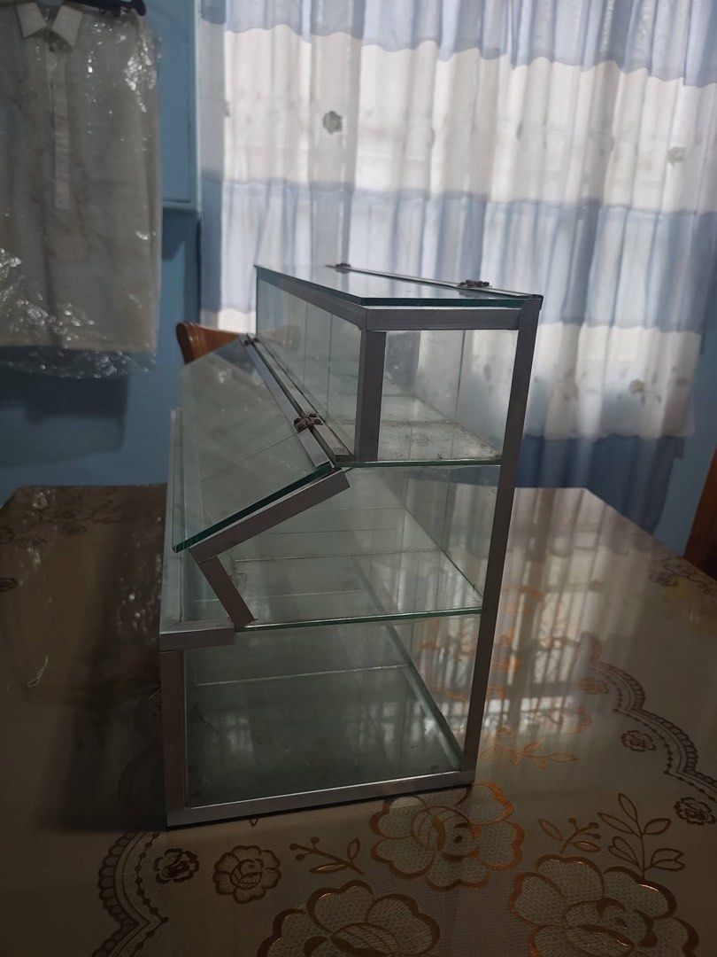 Stante Glass Display (Category: Shelves, Cabinets & Racks) located in Binan City. Submitted by preloved.cara (Listing ID 1447202126, Image 3). Description: Perfect for sar-sari store (candy, biscuits).