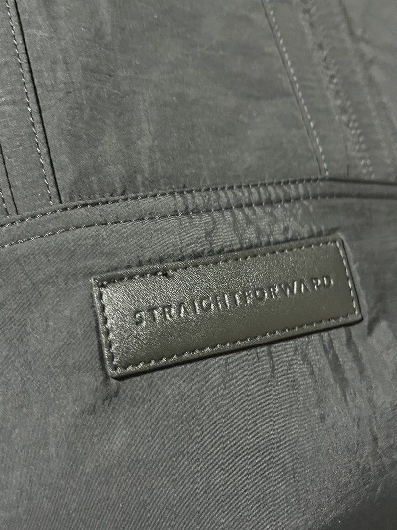 Straightforward Black Nylon Tote Bag (Category: Tote Bags) located in Koronadal. Submitted by wardrobe_declutter14 (Listing ID 1447259481, Image 2). Description: - Brand: Straightforward - Color: Black - Material: Nylon - Design: Clean, minimalist - Straps: Sturdy and comfortable - Interior: Spacious, fits daily essentials - Occasion: Ideal for work or casual outings -Can fit 15 inch gaming laptop.