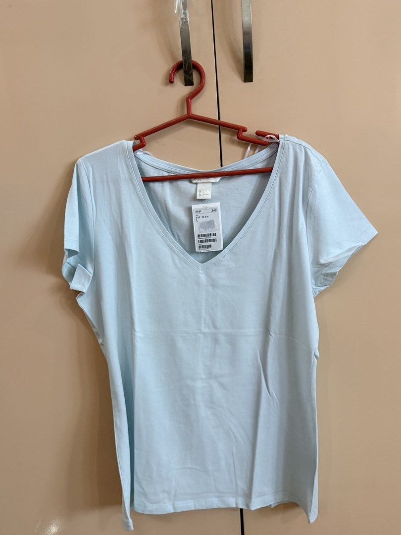TAKE ALL! H&M Basic V-Neck & Round Neck T-Shirts (3 Colors) (Category: Shirts) located in Manila. Submitted by emskyeclaire (Listing ID 1447261643, Image 3). Description: - Bundle of 3 H&M basic tees - Colors: Beige (V-neck), Light Blue (V-neck), Peach (Round Neck) - Sizes: M to L - Perfect for everyday wear - Great value bundle!.