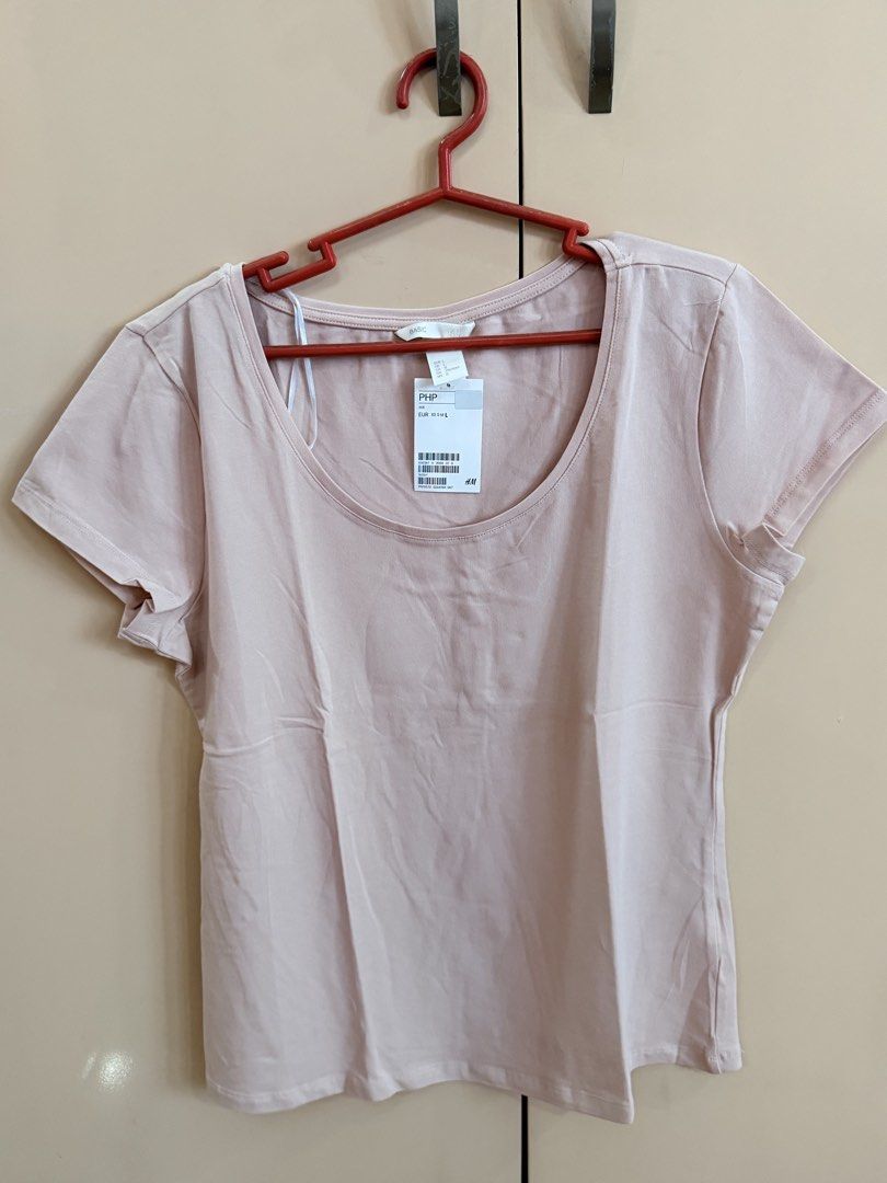 TAKE ALL! H&M Basic V-Neck & Round Neck T-Shirts (3 Colors) (Category: Shirts) located in Manila. Submitted by emskyeclaire (Listing ID 1447261643, Image 1). Description: - Bundle of 3 H&M basic tees - Colors: Beige (V-neck), Light Blue (V-neck), Peach (Round Neck) - Sizes: M to L - Perfect for everyday wear - Great value bundle!.