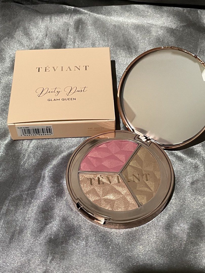 TEVIANT Deity Dust Glam Queen Face Palette (Category: Makeup) located in Cavite. Submitted by nobueno_ (Listing ID 1447240045, Image 2). Description: - Teviant Deity Dust Face Palette - SWATCHED ONLY - Shade: Glam Queen - Includes: 1 Blush, 1 Bronzer, 1 Highlighter - Features: Rose gold compact with mirror - Benefit: Adds a beautiful glow to your makeup look - Reason for Selling: I realized it’s not my shade .