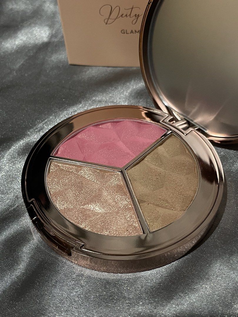 TEVIANT Deity Dust Glam Queen Face Palette (Category: Makeup) located in Cavite. Submitted by nobueno_ (Listing ID 1447240045, Image 3). Description: - Teviant Deity Dust Face Palette - SWATCHED ONLY - Shade: Glam Queen - Includes: 1 Blush, 1 Bronzer, 1 Highlighter - Features: Rose gold compact with mirror - Benefit: Adds a beautiful glow to your makeup look - Reason for Selling: I realized it’s not my shade .