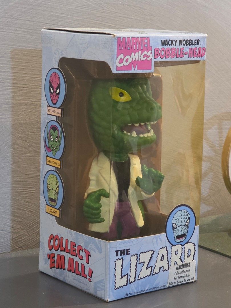 The Lizard (Collector Item) (Category: Figurines & Statues) located in Manila. Submitted by tch_86 (Listing ID 1447290351, Image 2). Description: - Marvel Comics The Lizard Wacky Wobbler Bobble-Head - Original packaging .