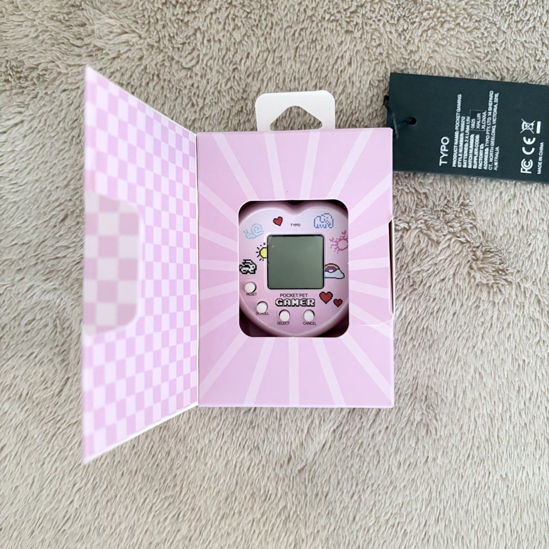 Typo Pocket Pet Gamer (Category: Interactive Toys) located in San Juan City. Submitted by _ands_ (Listing ID 1447201687, Image 2). Description: - Bnew; never used.