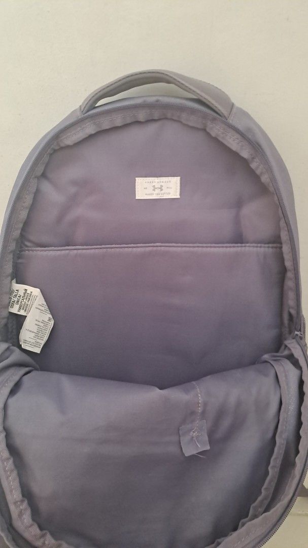 RUSH!! Under Armour light purple Backpack (Category: Backpacks) located in Muntinlupa City. Submitted by repurp0se (Listing ID 1447176648, Image 3). Description: Original Under armour Hustle (signature backpack) - Great for travel and backpacking - Has a few stains from storage but are removable (last slide) - Condition is Great aside from the stains but all in all goods - Color may differ from the picture because of lighting.