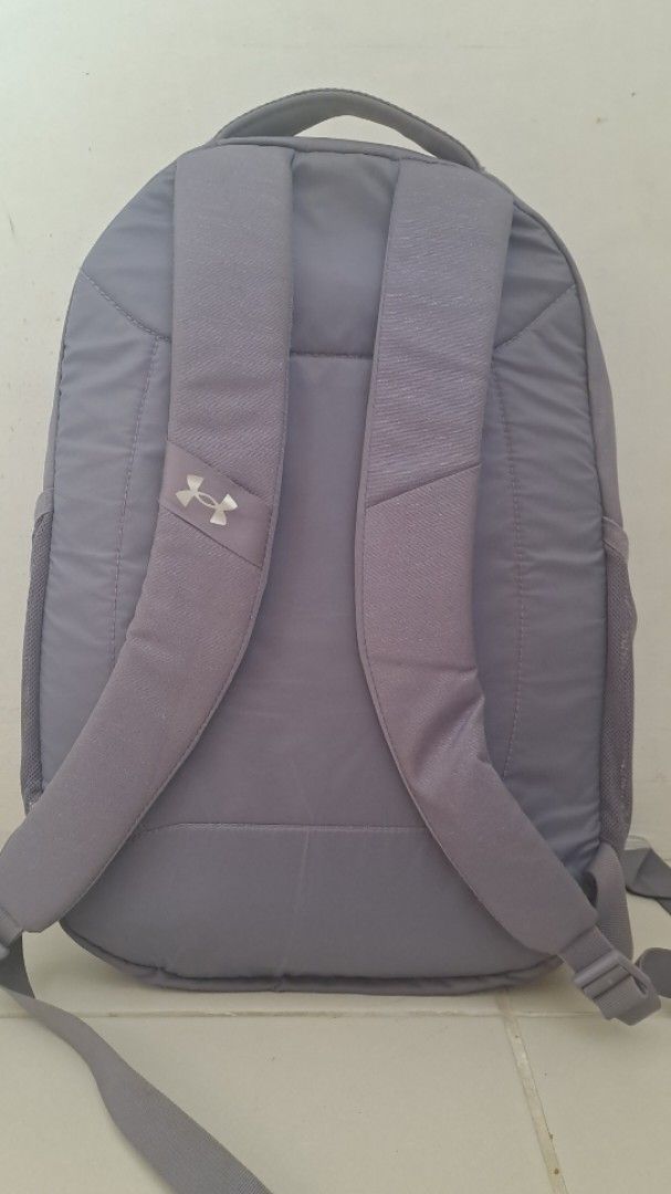 RUSH!! Under Armour light purple Backpack (Category: Backpacks) located in Muntinlupa City. Submitted by repurp0se (Listing ID 1447176648, Image 2). Description: Original Under armour Hustle (signature backpack) - Great for travel and backpacking - Has a few stains from storage but are removable (last slide) - Condition is Great aside from the stains but all in all goods - Color may differ from the picture because of lighting.