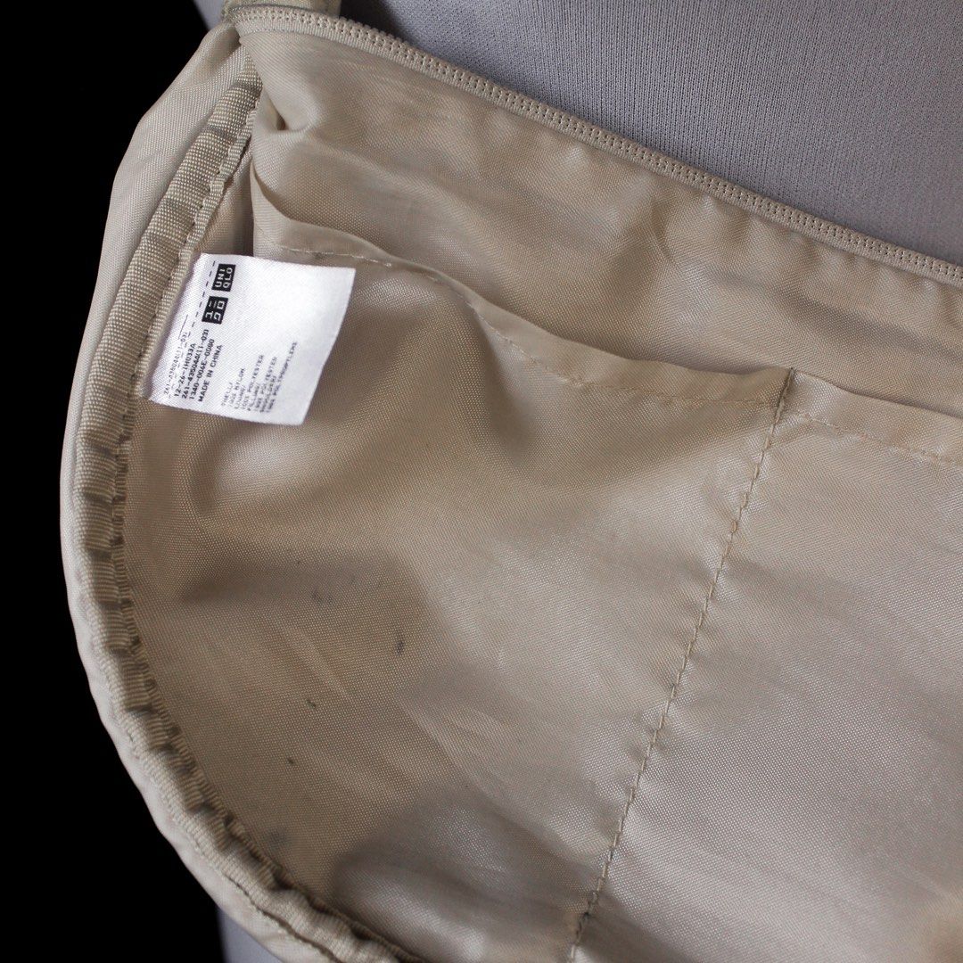 Uniqlo Beige Round Mini Shoulder Bag (Category: Cross-body Bags) located in Malvar. Submitted by shopwsf (Listing ID 1447209350, Image 3). Description: Location: Batangas Shipping: J&T, c/o buyer MOP: Gcash or Gotyme.