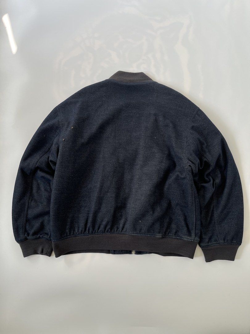 Vintage 90’s Wool Flight Bomber Jacket (Category: Coats, Jackets and Outerwear) located in Dagupan City. Submitted by nigsstuff.com (Listing ID 1447275719, Image 2). Description: Vintage 90’s U2 •wool bomber flight jacket In a great condition Issue: minor fade vintage vibe Model Height 5’8 65kgs Size Large “Boxy” Length 24.5 Width: 24.5 Swipe for details Swipe to see the photo and condition of the item.