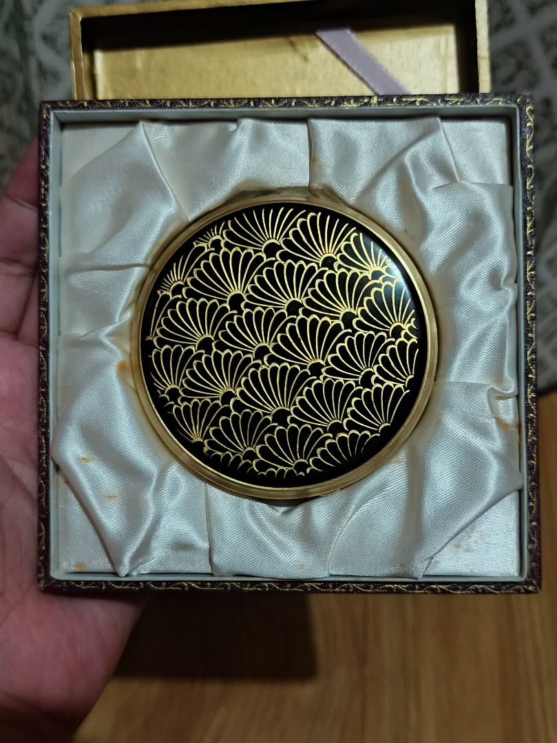 Vintage Pink Lady Powder Compact with Case (Category: Makeup) located in Makati City. Submitted by nyxhemera26 (Listing ID 1447290421, Image 2). Description: Vintage Pink Lady powder compact - Features a black and gold fan pattern on the lid - Comes with original box and satin lining - Mirror is clear - Original powder puff and paper insert included - Ideal collectible for vanity display 📍PLEASE DO NOTE THAT BOX IS NO LONGER IN VERY GOOD CONDITI