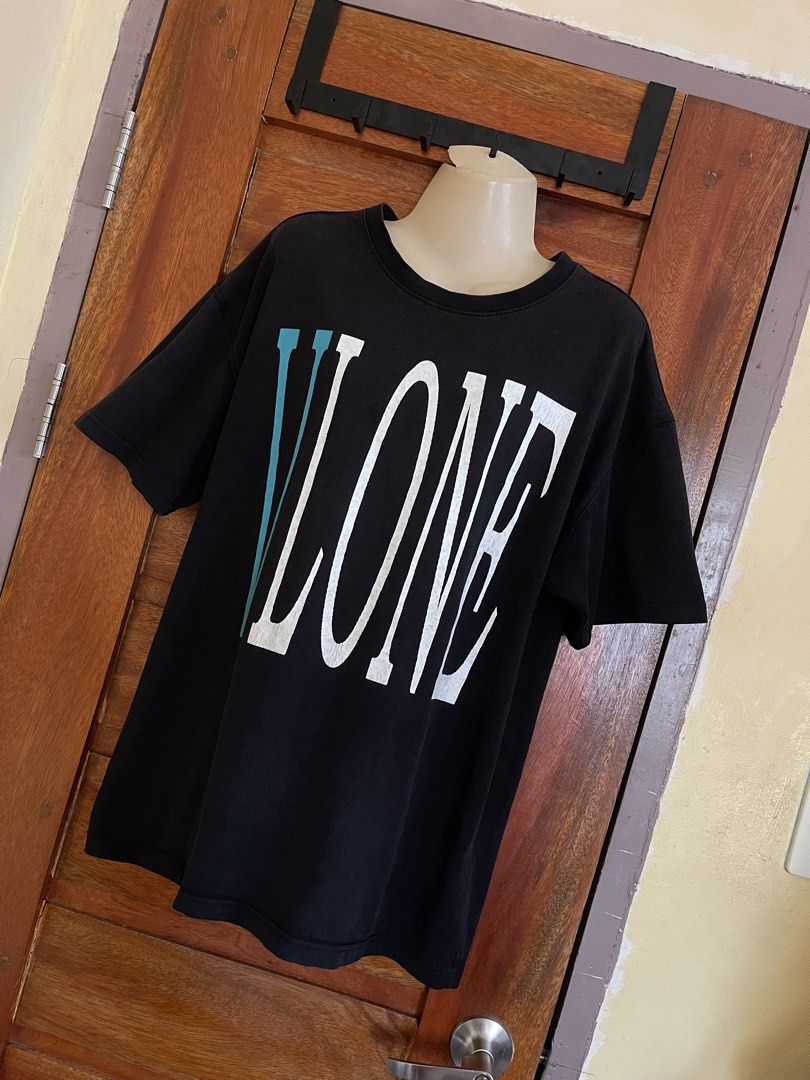 Vlone Shirt (Category: Tshirts & Polo Shirts ) located in Baler. Submitted by declutterwithrhys (Listing ID 1447115647, Image 2). Description: FOR SALE (PLEASE MAKE READING A HABIT) VLONE BIG LOGO SHIRT COLOR BLACK, TEAL, AND WHITE IN EXCELLENT CONDITION THICK FABRIC COLOR RATE 9/10 WIDTH 21.5 INCHES | LENGTH 28.5 INCHES BEST FIT SIZE MEDIUM TO LARGE BODY FRAME WITH MINIMAL CRACK PRINTS MISSING NECK TAG COLOR MAY ALSO VARY DUE TO LIGHTING KINDLY 