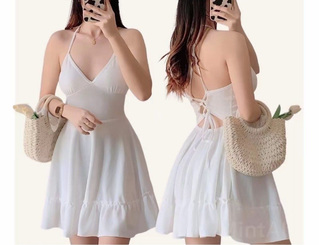 White Halter Neck Mini Dress with Tie Back (Category: Dresses) located in Silang. Submitted by declutterswuni (Listing ID 1447207474, Image 1). Description: - Cute white mini dress - Halter neck with tie-up back - Ruffled hem detail - Ideal for summer or beach vacation - Lightweight and easy to wear/style.