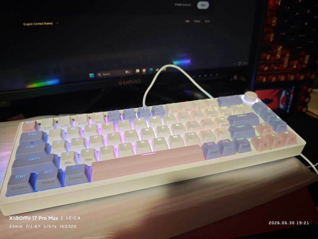 White Mechanical Keyboard with Pastel Keycaps (Category: Computer Keyboard) located in Quezon City. Submitted by projectzeroo26 (Listing ID 1447188788, Image 2). Description: - White mechanical keyboard - Pastel pink, purple, and blue keycaps - RGB lighting along the bottom edge - Includes extra keycaps - Ideal for gaming and typing.