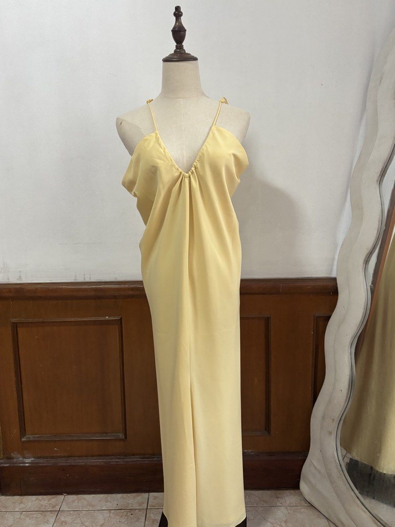 Yellow self tie dress (Category: Evening dresses & gowns) located in Cebu City. Submitted by copherlook (Listing ID 1447222962, Image 3). Description: Featured in a vibrant canary yellow with delicate spaghetti straps and a flowing silhouette..