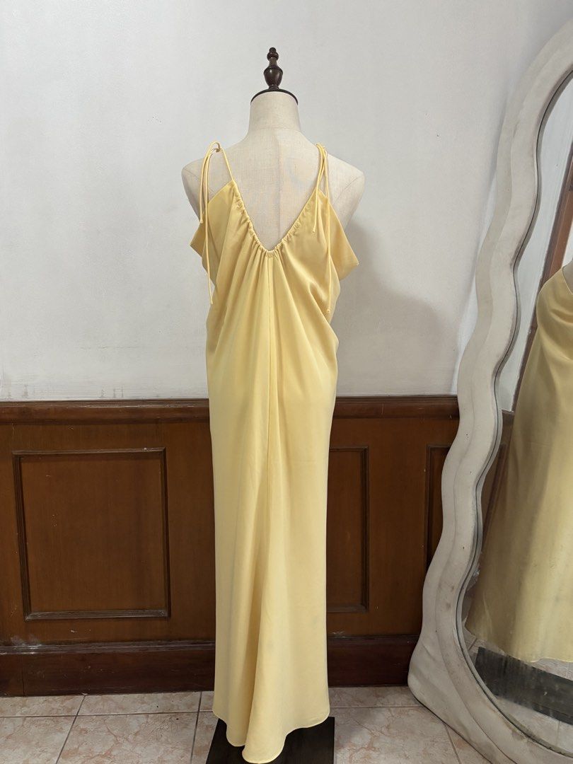 Yellow self tie dress (Category: Evening dresses & gowns) located in Cebu City. Submitted by copherlook (Listing ID 1447222962, Image 2). Description: Featured in a vibrant canary yellow with delicate spaghetti straps and a flowing silhouette..