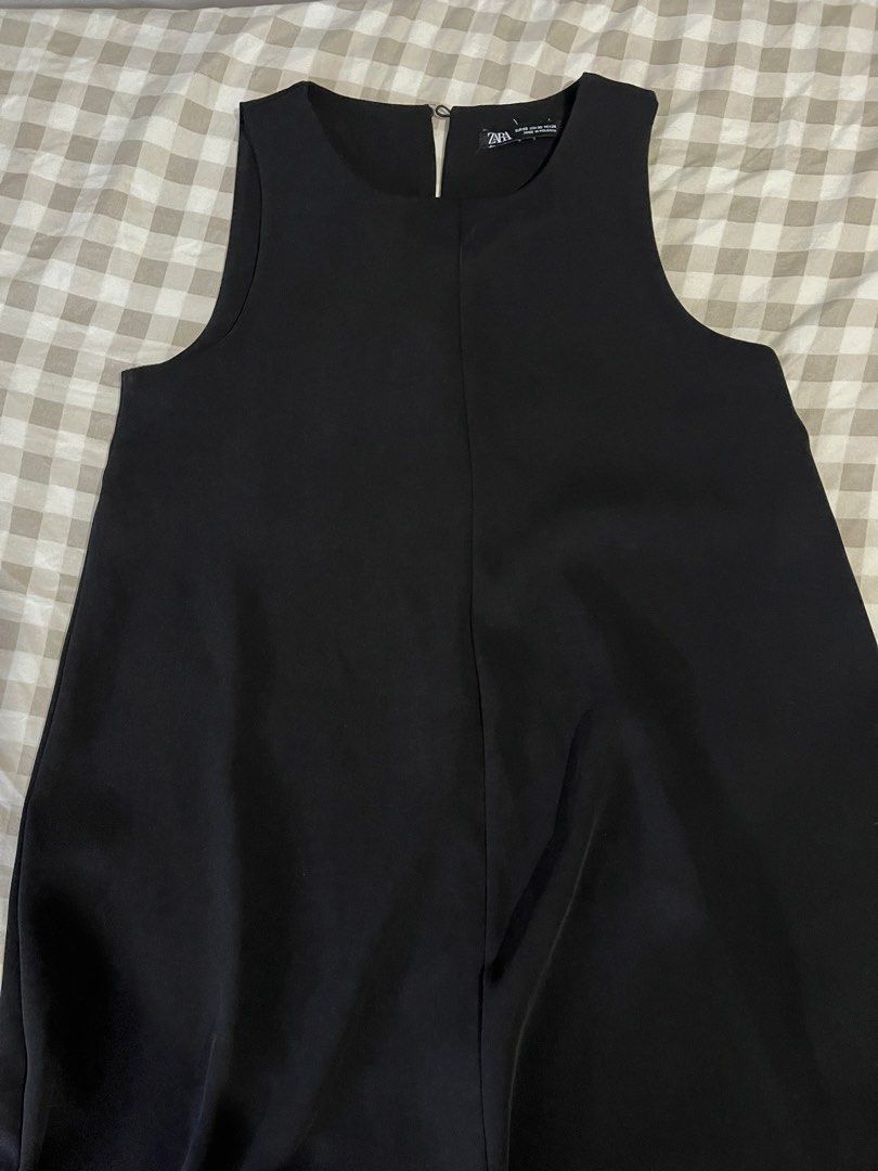 Zara Black Sleeveless Mini Dress (Category: Dresses) located in Kawit. Submitted by akcmrc (Listing ID 1447233601, Image 1). Description: 📍Kawit, Cavite ❕SHIPPING EVERY WEEKEND❕ ✨see pics for measurements ✨no ww if not included in the post too many to try on pagod na po me please 🥹 - Zara black sleeveless mini dress - Round neckline - Back zipper closure - Simple and versatile design - Suitable for various occasions - Please check photos for de